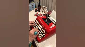 Typing a message on a 1950s Smith-Corona typewriter for National Typewriter Day (June 23)