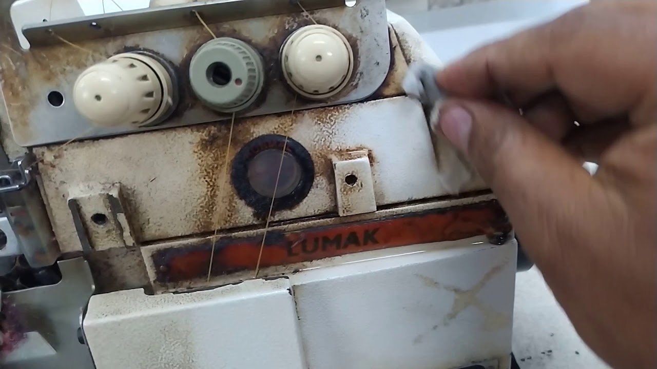 limpeza externa da máquina de costura overlock