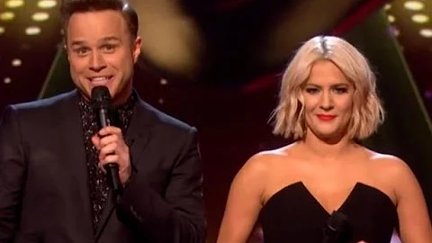 Olly Murs steals a KISS from Caroline Flack after telling her he LOVES her