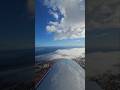 Small Plane playing in winter clouds
