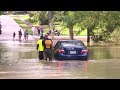 Kprc 2 news crew witnesses woman ignore houston firefighters warning drive into flood waters