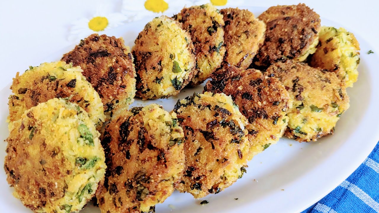 Leckere, vegetarische Frikadellen mit Reis und Karotten. Knusprig von außen einfaches Rezept