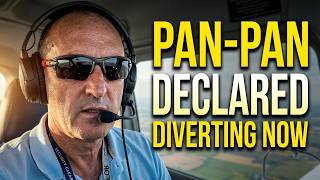 Engine Warning in the climb to FL100 Declaring a PAN in the Cirrus Diversion and Landing