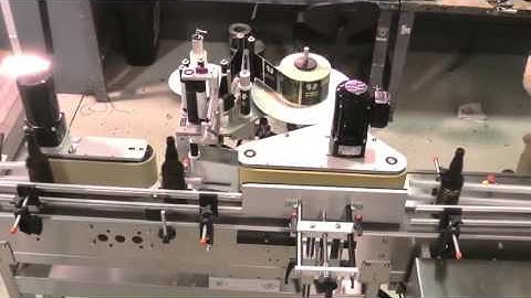 Quadrel Beer Bottle Labeling System with In feed Accumulation Table