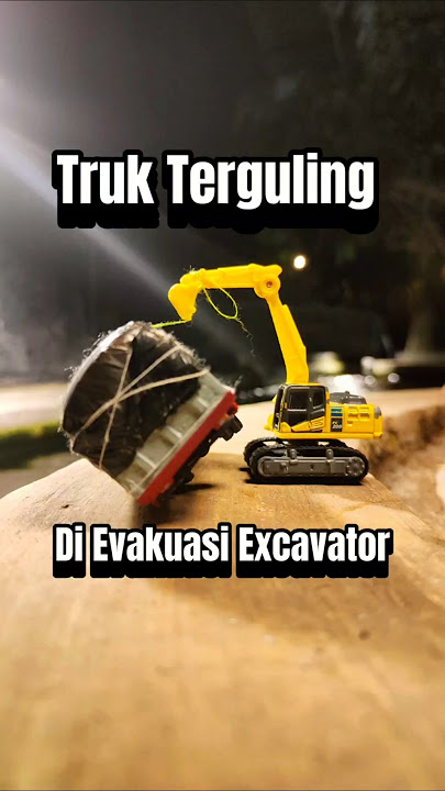 Truk Overload Terguling di'bangunkan' Excavator