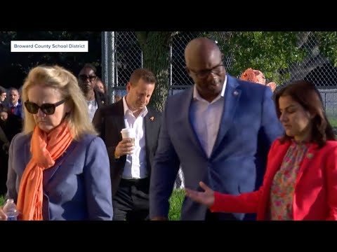 Members of Congress, families tour Marjory Stoneman Douglas High School shooting scene