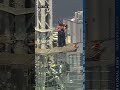2 people climb to top of Empire State Building and appear to get engaged -- and arrested