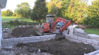 Hitachi Mini Digger prepares a Foundation