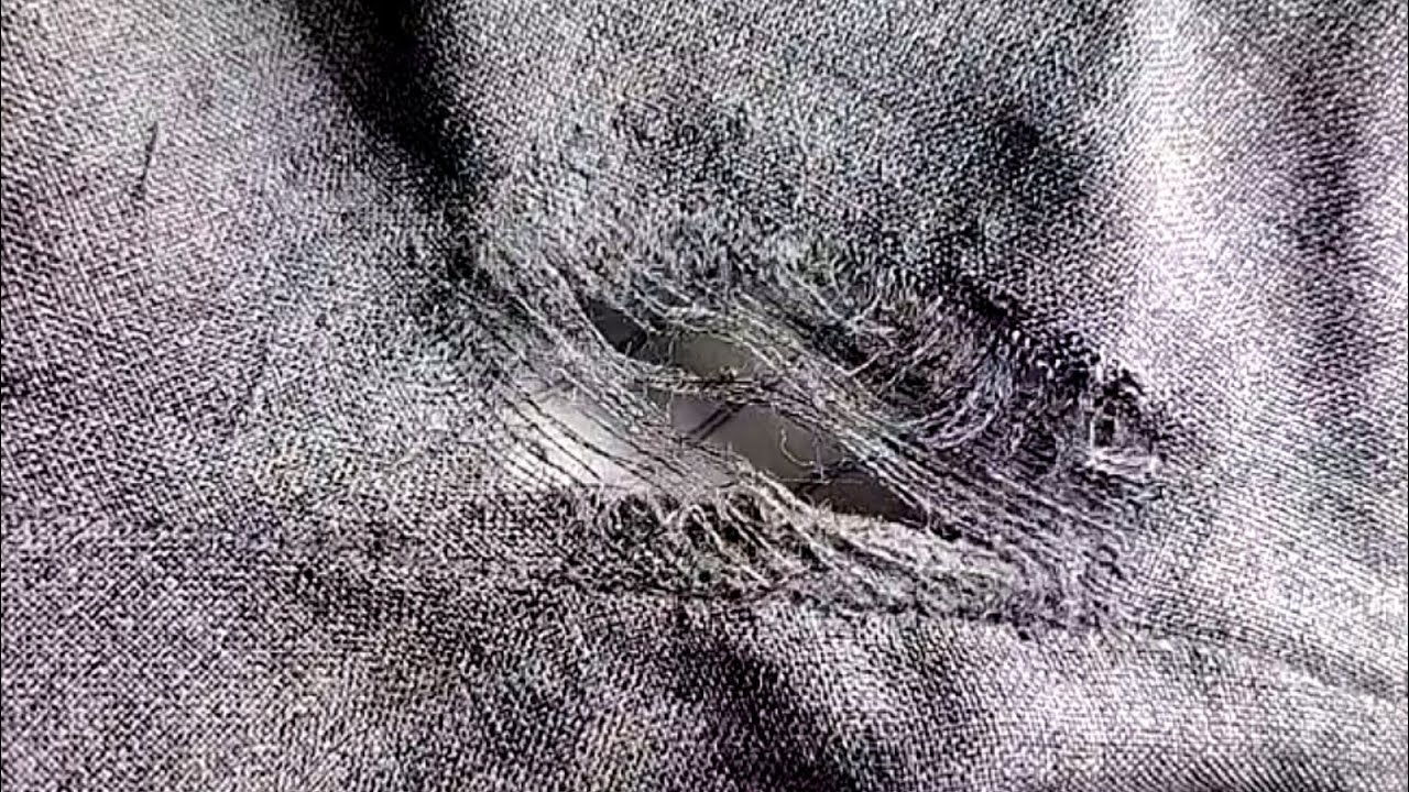 How to Invisibly Repair a Hole in Pants with a Sewing Needle - YouTube