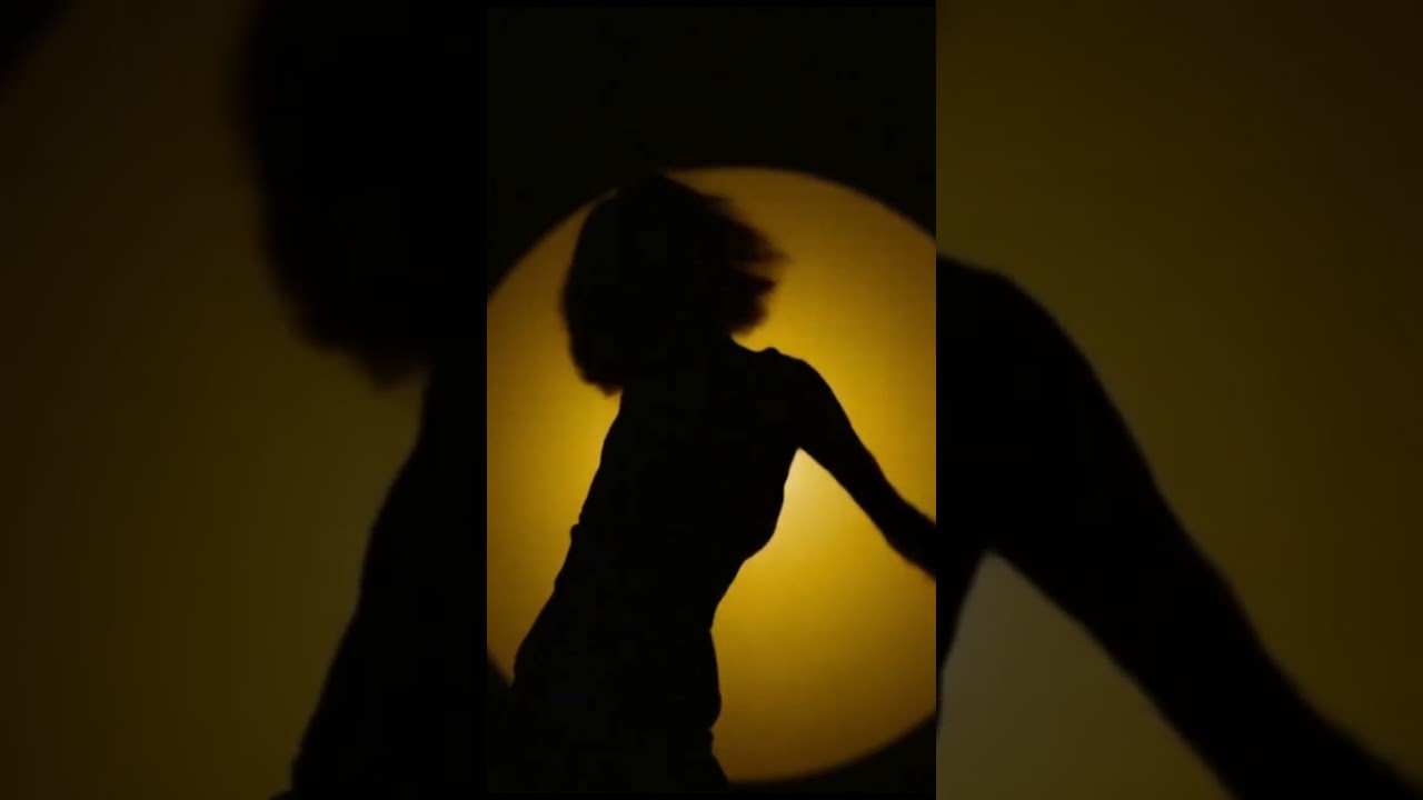 Shaddow women dancing.