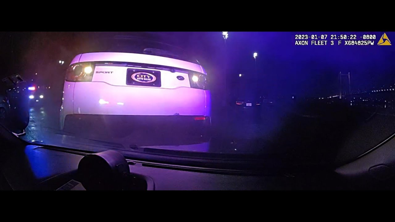 Suspect drives onto police car hood YouTube