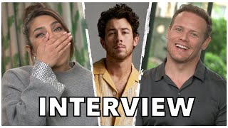 &quot;I THINK HE LICKED YOUR FACE&quot; Priyanka Chopra Jonas &amp; Sam Heughan Laugh About Nick Jonas | INTERVIEW