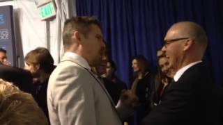 Michael Keaton and Ethan Hawke laugh backstage at Critics' Choice Awards