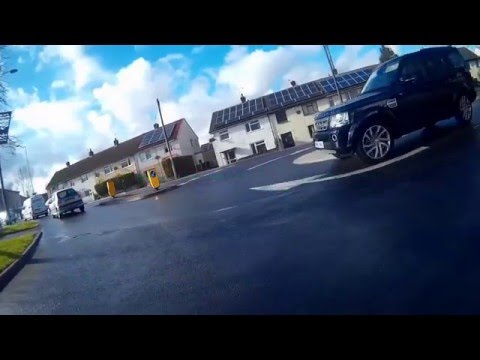 Car fails to give way to bike at roundabout - YouTube