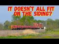 Two super trains pass each other both of them over 2 miles long as a roadrailer waits to pass both