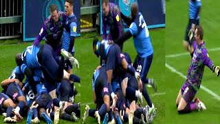 Akinfenwa enjoying Wycombe's 98th minute leveller at the weekend...