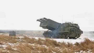 British Army Gunners fire Multi Launch Rocket System at Otterburn