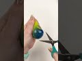 Cutting open color changing stress ball shorts