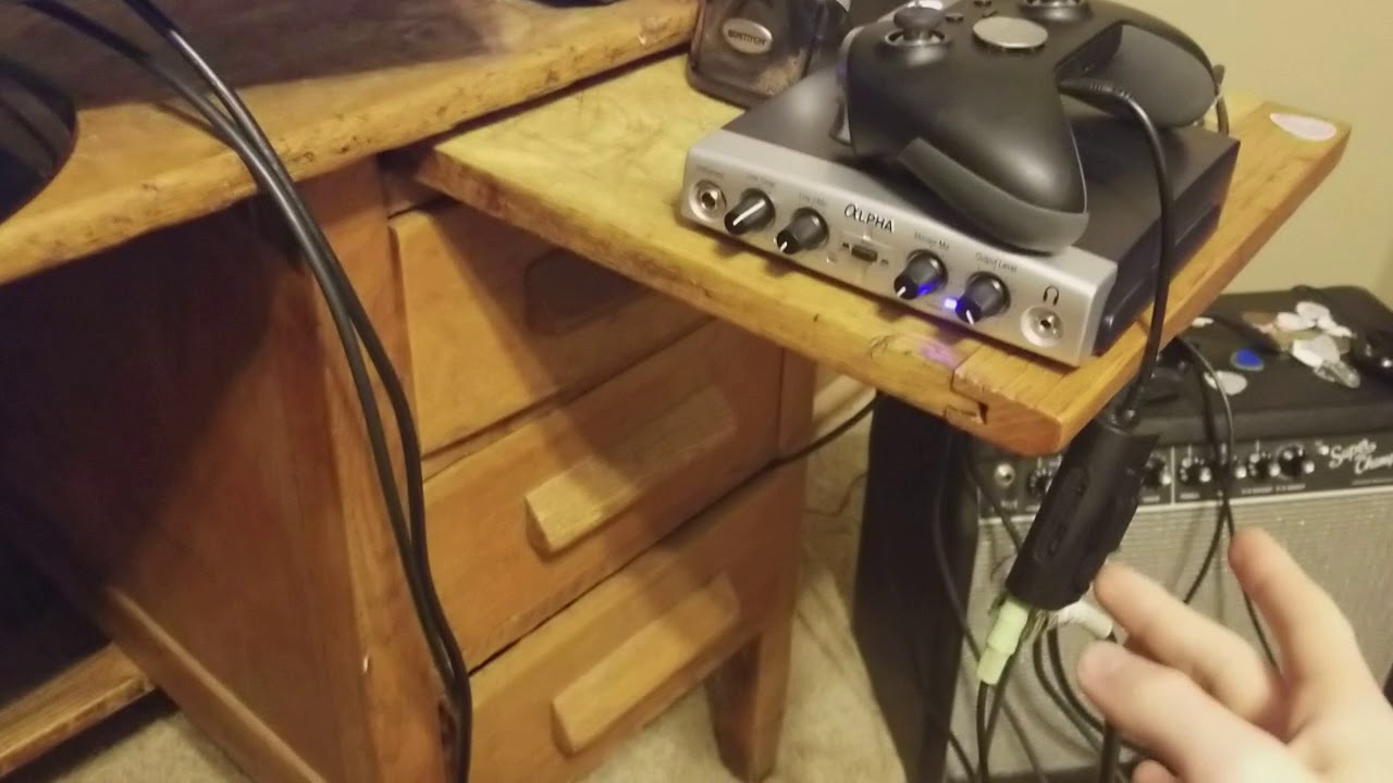 an XLR or 1/4 inch mic into your Xbox 