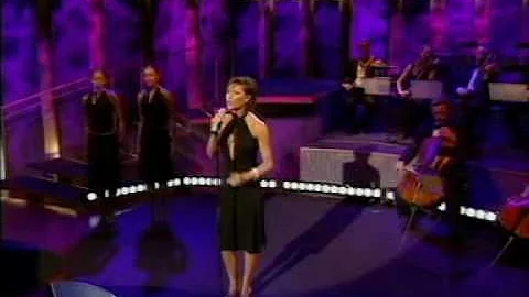 Does Posh Spice sing in wannabe?