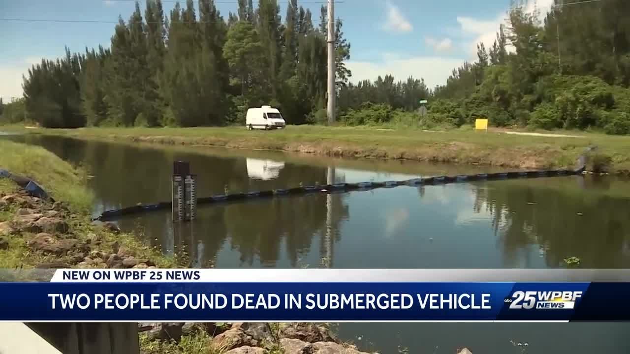 Two people found dead in submerged vehicle - YouTube