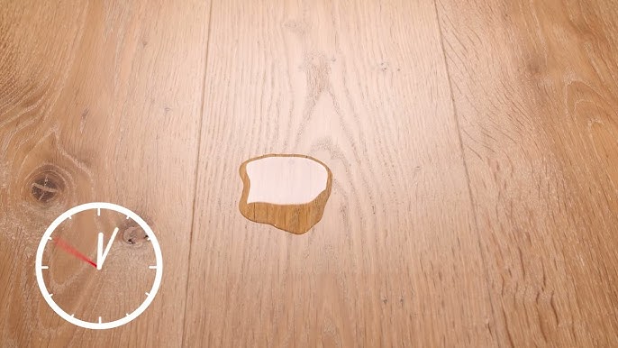 azijn op houten vloer