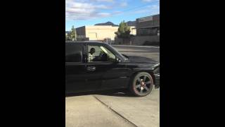 My 2005 Chevrolet Avalanche smoking some rubber
