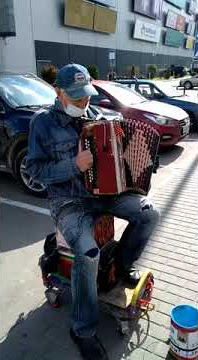Russian accordionist plays traditional music called 'Plyaska'.
