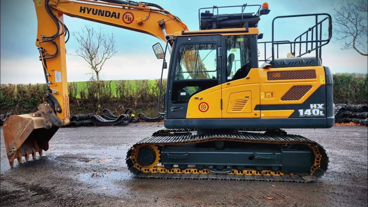 HYUNDAI HX140L gets Chains and Sprockets @ Undercarriage Ireland - YouTube
