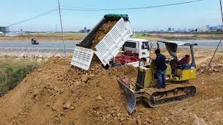 Wonderful work starting new project landfill with powerful Komatsu D31A bulldozer & dump truck
