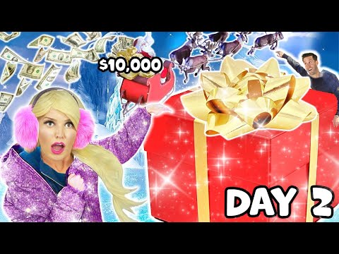 LAST TO REMOVE HAND FROM GIANT PRESENT WINS $10,000 CHALLENGE! Jenn Barlow