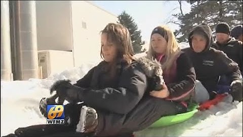 Man builds backyard luge track