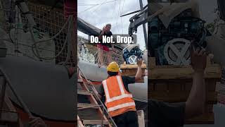 Watching out engine swinig 5 metres above the ground 🫣 #boatrefit #marinediesel #boatlifestyle