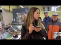 Sandra visits supermarket with Sergei Magadan Russia - ZK-BAZ - RTW 2019
