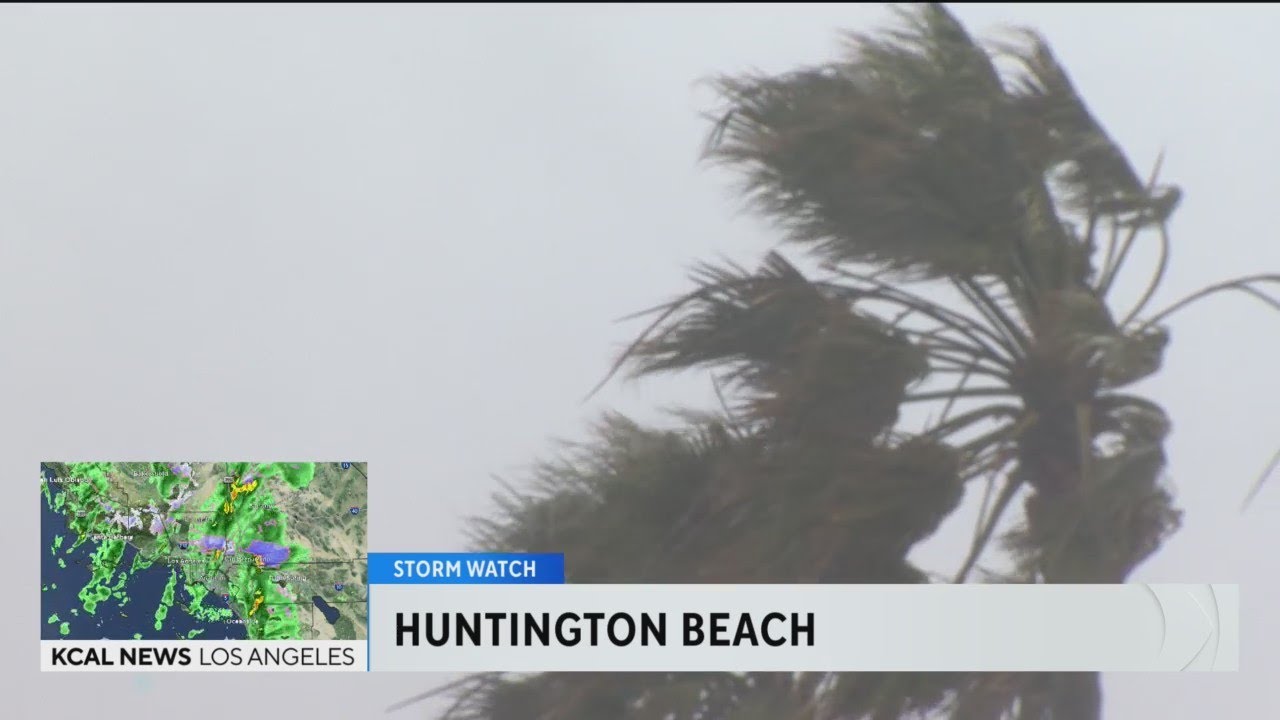 Rain floods streets near landslide site in Orange County