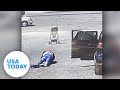 Good Samaritan rescues baby stroller from rolling into traffic | USA TODAY