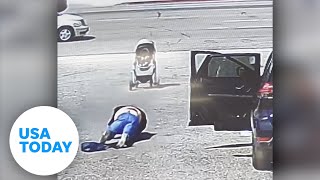 Good Samaritan rescues baby stroller from rolling into traffic | USA TODAY