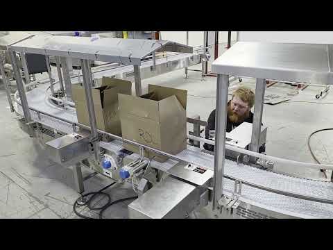 Protected Bag in Box Bulk Fill to Seal with Traffic Assist by Multi-Conveyor