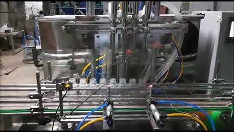 4 Head Automatic Liquid Filling Machine | Adroit Engineers