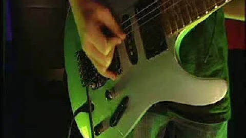 Daniel Stojanovic playing guitar on Garage 2008