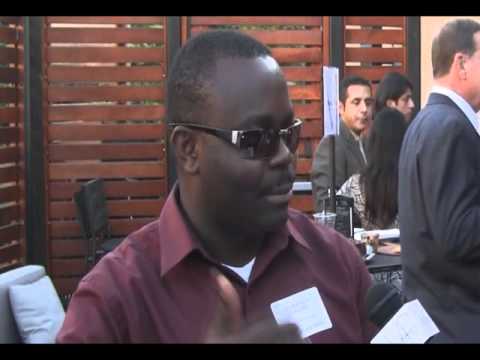 Olukayode Ojelade speaks with Philip Dahlheimer (o...