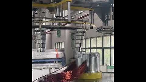 Automatic wind turbine stator coil winding and inserting