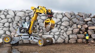 A framework for robotic excavation and dry stone construction using on-site materials