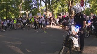 Hundreds of protesters peacefully march through Charlotte