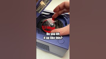 How do you take games out of your GameCube?