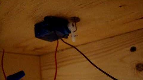 Servo operating Peco code 83 turnout. $2 switch machine. 9V pushbutton operation