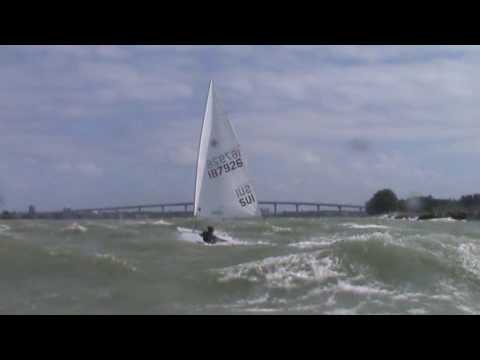 Christian Steiger sailiing Laser in strong winds.