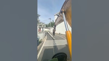 5377: Smooth moves: Excavator operator in China balances and plants utility pole with ease