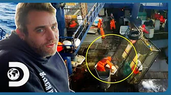 Deckhand Takes A HUGE Hit To The Head By A Swinging Crab Cage! | Deadliest Catch