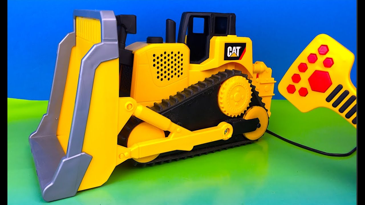 CAT AT JOBSITE MIGHTY MACHINE BULLDOZER WITH REMOTE CONTROL SLOW MOTION  LIGHTS SOUNDS & ACTION
